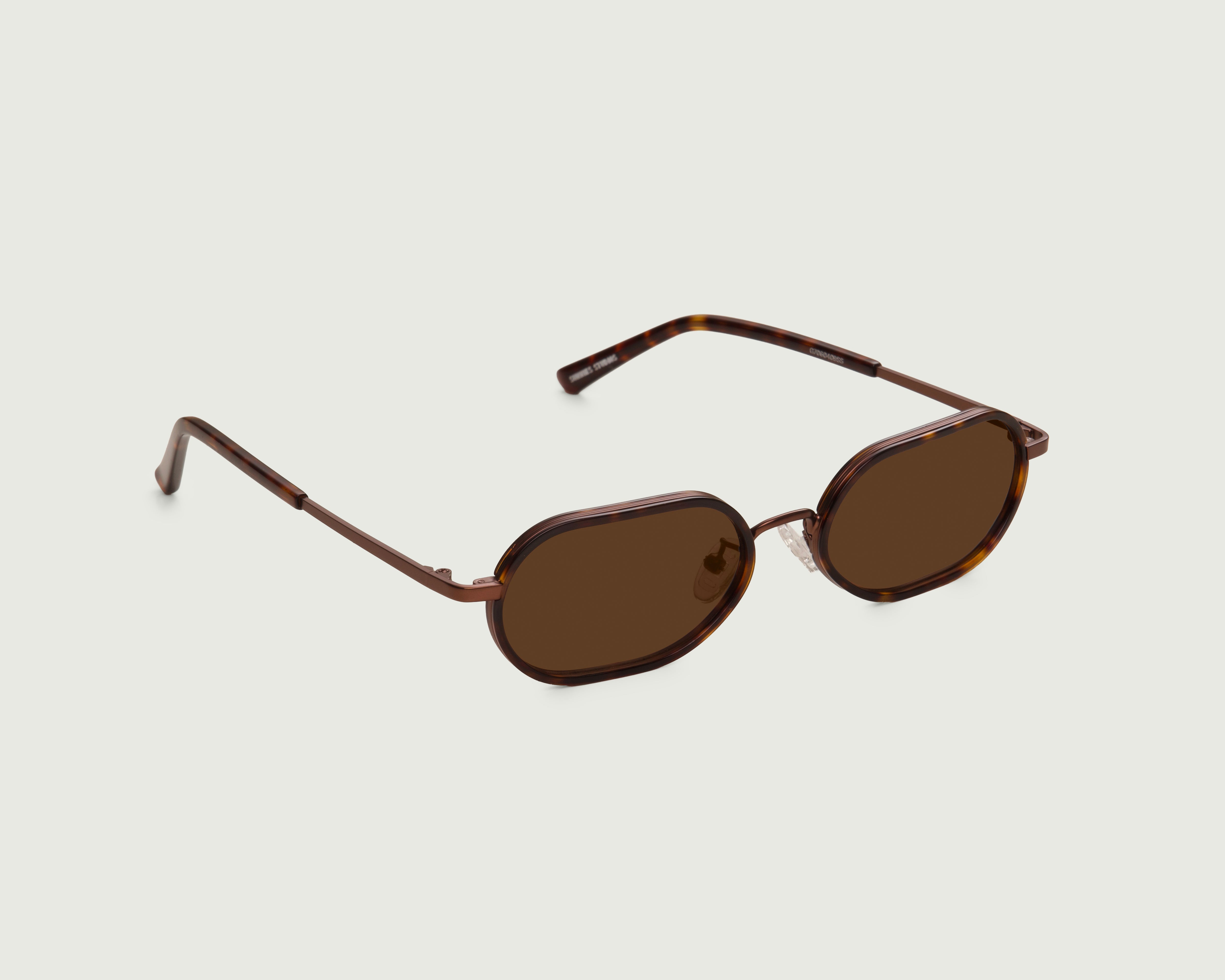 Classic Tort:: Sunglasses Oval tort recycled polyester front diagonal